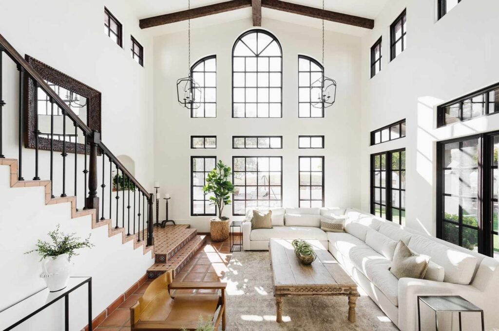 bright organized home cozy living room natural light.jpg  casa iluminada e organizada sala de estar aconchegante luz natural.jpg essas são dicas para deixar a casa mais leve e agradável sala organizada com Iluminação natural ambiente acolhedor